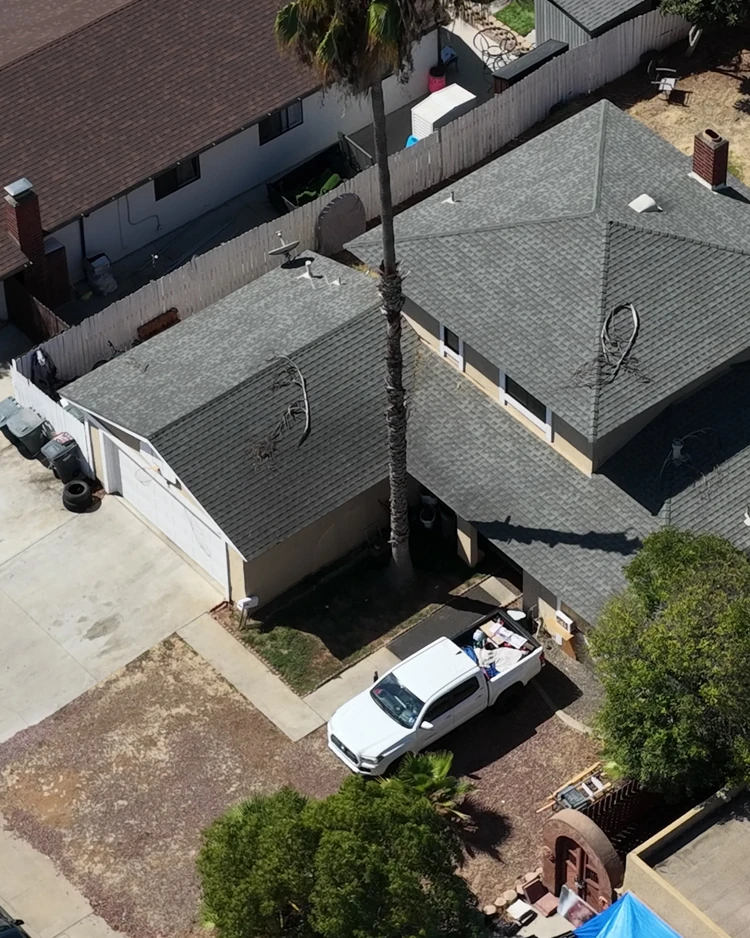 Aerial view of the house and attached garage at 1057 Camellia Street in Escondido; property boundaries are not shown